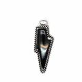 Detail view of a vintage lightning-shaped pendant featuring a polished black natural stone - Obsidian