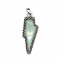 Detailed macro view of a vintage lightning bolt pendant with pale green natural stone inlay. - Aventurine Jade