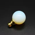 Macro view of a 16mm round opal stone essential oil bottle pendant with a gold metal cap. - Gold Cap / 16mm / Opal
