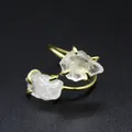 Macro view of double raw natural stones set in a gold-plated adjustable ring band. - White Crystal