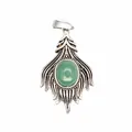 Detailed macro view of a vintage silver pendant featuring an oval green agate stone - Aventurine Jade