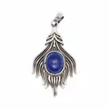 Close-up of vintage silver pendant with oval blue lapis lazuli stone inlay - Lapis Lazuli