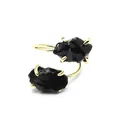Detailed view of adjustable gold-plated ring with two raw black natural gemstones - Obsidian