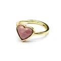 Detailed macro view of a faceted heart-shaped pink stone ring with a gold-tone band. - Rhodonite