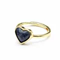Close-up detail of a golden adjustable ring featuring a faceted heart-shaped blue natural stone. - Lapis Lazuli
