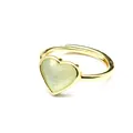 Detail view of heart-shaped faceted light green natural stone on adjustable gold ring - Aquamarine