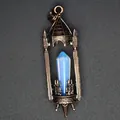 Detailed view of vintage medieval castle pendant with hexagonal blue opalite crystal pillar - Opal / Antique Red Copper