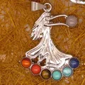 Detailed view of a silver goddess pendant with seven colorful chakra stones and gem inlays - Goddess Figure Style (8)