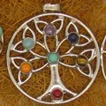 Close-up of silver Tree of Life pendant with seven colorful chakra gemstones - Hollow Tree of Life Style (13)