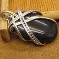 Elegant natural blue sandstone pendant necklace with silver-tone wire wrap detail - Blue Sandstone Pendant