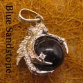 Intricately designed dragon claw pendant holding a glittering dark blue sandstone orb - Dragon Claw Grip (aljylp0065) / Blue Sandstone Pendant