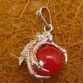 Intricate silver-tone dragon claw pendant clutching a vibrant red round agate stone - Dragon Claw Grip (aljylp0065) / Carnelian Pendant