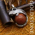 Exquisites Goldstein-Eidechsen-Anhaenger-Halskette mit einer funkelnden braunen Steinkugel - Goldsandstein
