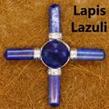 Natural lapis lazuli cross healing crystal wand with central pyramid dome on straw background - Lapis Lazuli
