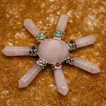 Seven-star rose quartz crystal array featuring hexagonal pillars and colorful stones decoration. - K9 / Rose Quartz