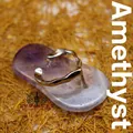 Unique purple amethyst crystal flip-flop shaped pendant with silver-tone metal strap detail - Amethyst