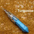 Elegant hexagonal turquoise crystal pillar pendant featuring an ornate silver metal filigree cap - Blue Turquoise