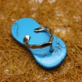Unique blue turquoise stone flip-flop pendant charm with silver-colored metal straps - Blue Turquoise