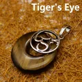 Natuurlijke tijgeroog steen donut hanger met zilveren Om symbool voor kettingen - Om Symbool Pi Schijf Stijl (aljylp335) / 1 Stuk / Tijgeroog