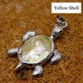 Small sea turtle pendant with yellow mother of pearl shell inlay in silver-tone metal - Sea Turtle Shape Pendant (aljylp416) / Yellow Shell