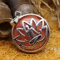 Ethnic style red agate pendant necklace featuring a silver lotus and meditation design - Watermelon red