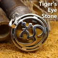 Traditional hollowed-out Tiger's Eye stone pendant necklace with vintage silver finish - Tiger's Eye