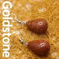 Elegant teardrop-shaped brown goldstone earrings with sparkling golden sand texture - Gold Sandstone