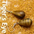 Natural polished teardrop tiger eye stone earrings featuring elegant silver-tone hooks - Tiger's Eye