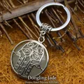 Ethnic green aventurine hamsa hand pendant keychain featuring a silver-tone metal frame - Aventurine Jade