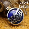 Vintage style circular lapis lazuli pendant necklace featuring a silver lotus design - Lapis Lazuli
