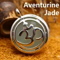 Elegant white crystal pendant necklace featuring a polished silver Om symbol cutout design - K9 / Aventurine Jade