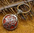 Ethnic style silver Hamsa hand charm keychain with a round red agate stone pendant - Red Jasper
