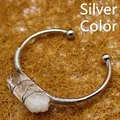 Verstellbares silbernes Armband mit einem markanten, rohen weißen Kristallquarzpunkt - Silber