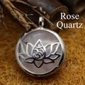 Vintage lotus flower rose quartz pendant necklace featuring silver Om symbol design - Rose Quartz