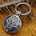 Ethnic Hamsa hand keychain with natural blue sodalite stone pendant in silver finish - Blue Spot Jasper