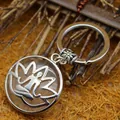 Exquisiter Schlüsselanhänger mit Lotus-Anhänger aus Bergkristall und filigranem Metalldesign - Weiß Kristall