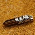 Natural hexagonal tiger's eye stone pendant featuring a silver-colored dragon wrap - Tiger's Eye