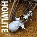 Eleganter weißer Howlith-Anhänger mit silbernem Flügel-Design für Damen - Howlith