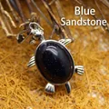 Colgante de tortuga con piedra de arena azul brillante y metal plateado - Piedra de Arena Azul