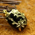 Golden floral vine necklace pendant featuring a polished black agate gemstone - Floral Hollow Style (aljylp494) / 28x20mm / Black Agate