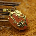 Ethnic style gold-plated leaf wrap pendant with oval watermelon red crystal stone - Floral Hollow Style (aljylp494) / 28x20mm / Watermelon red