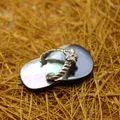 Unique flip-flop shaped pink shell pendant with flower detail in silver finish - Black Shell