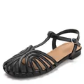 Elegant retro hollow-out closed-toe T-strap flat sandals in classic black faux leather - 36 / Black