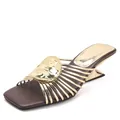 Elegant French style metallic mules with irregular gold heels and radiated straps. - 35 / Gold