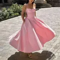 Elegante vestido midi rosa de estilo vintage francés con bolsillos y falda amplia - Rosa