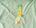 Vibrant green and yellow tie-dye mid-calf socks with ribbed texture for style. - One Size / Yellow-Green