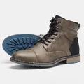 Close-up of vintage brown men's Martin boots showing detailed side view and blue sole - 7 / Vintage Brown & Black Patchwork Style (KD612)