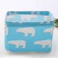 Compact cotton linen storage basket featuring a cute white polar bear print in blue fabric - Sky Blue Bear