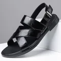 Stylish black leather men's sandals with cross-straps shown from a 45-degree angle. - 38 / Black (8923)