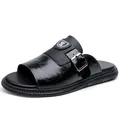 Premium black men's slide sandals featuring buckle strap and textured leather finish - 38 / Black